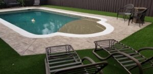 artificial pool area turf and pavements